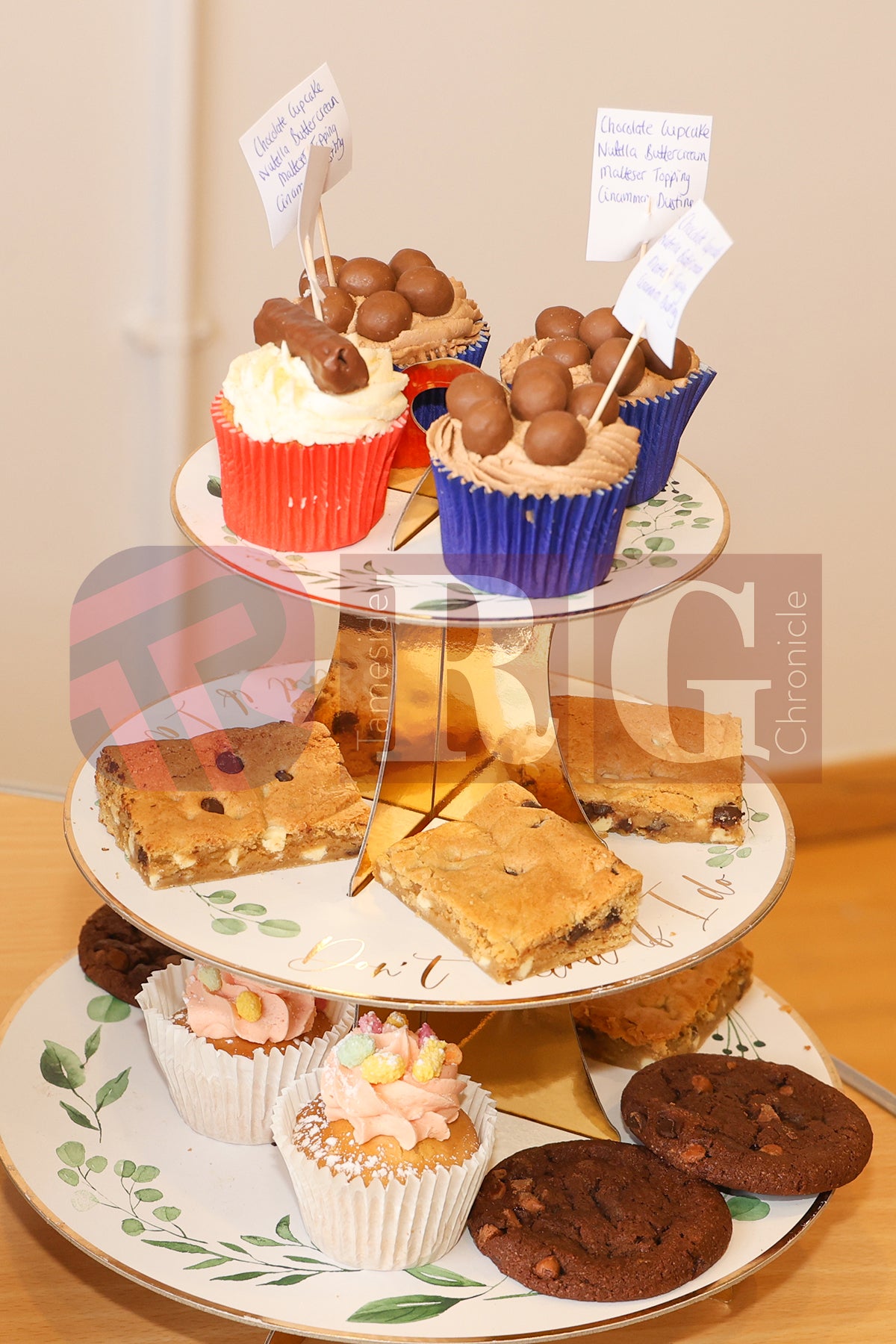 MOSSLEY HOLLINS MACMILLAN CAKE SALE 2024 (14).JPG